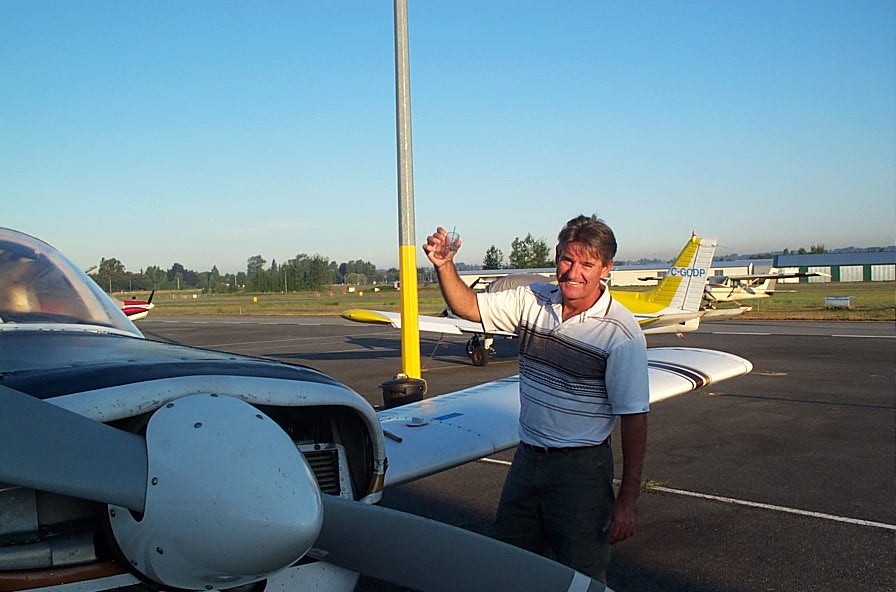 Preflight inspection of fuel. Langley Flying School.